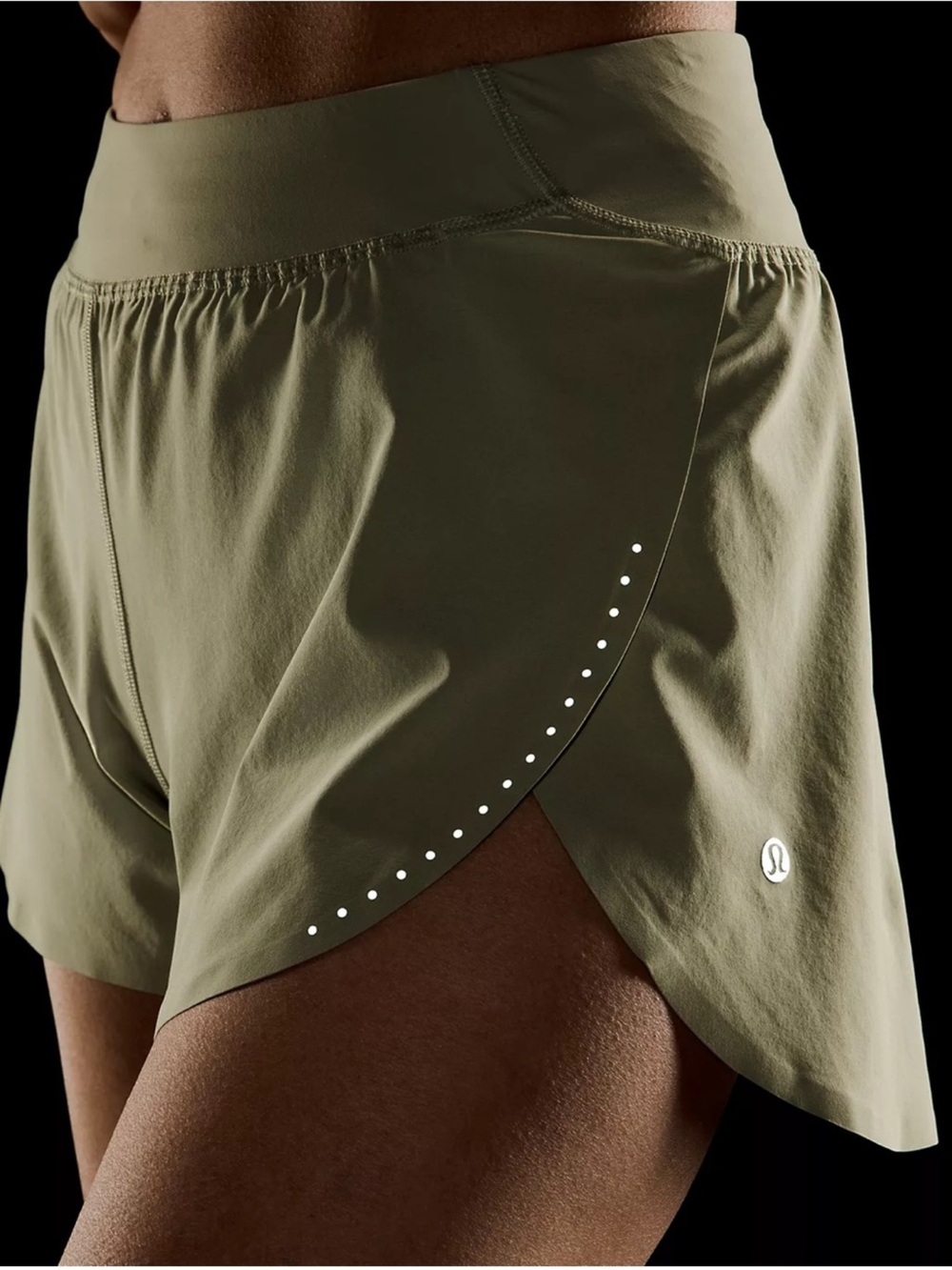 lululemon athletica olive green athletic shorts with reflective dots